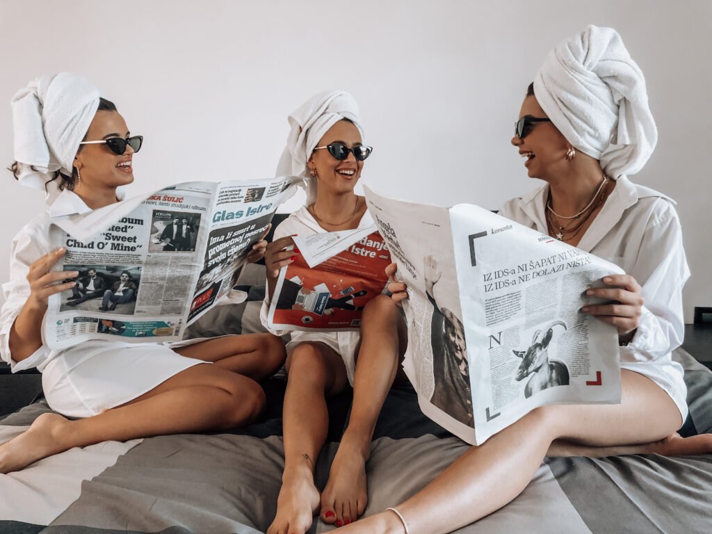 Three girls laughing together